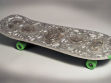 Darío Escobar, Untitled, 2000. Silver, tin, and aluminium embossed and hammered onto skateboard. Collection of Diana and Moises Berezdivin, San Juan, Puerto Rico.