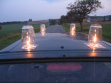 The members of the Rafani group lit four candles on the roof of a car wich they pushed through the country until the candles went out, 2007.