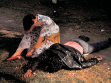 Enrique Metinides, A woman mourns the death of a friend, killed in Chapultepec-Park, while resisting robbers, Mexico City, 1995, courtesy of the Kurimanzutto gallery in Mexico City, photo by: Enrique Metinides.